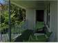 Rocking chairs, streamside garden below