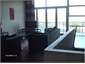 The upstairs open plan, kitchen, dining and lounge