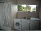 Laundry has full bath, w/d and utility sink