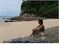 Secluded beach over hill behind house