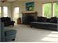 Lounge features 3 huge sofas and gorgeous fire