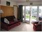 Downstairs living room opens to verandah