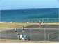 Public tennis court Onemana Beach