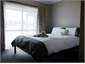 Queen bed, opens onto deck