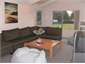 upstairs lounge, doors open onto deck