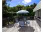 Relax on the deck at Puriri Lodge