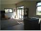 View kitchen to lounge
