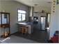 View lounge to kitchen