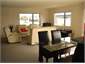 Open plan living opening to patio