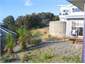 The "yard" plus sandpit for kids next to tank