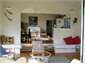 From Western deck through lounge to kitchen