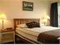 The master bedroom with access to main deck.