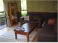 Comfortable living room with books, games, TV/DVD