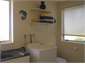 bathroom with washer