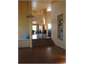 View from living through dining to bedrooms