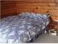 Queen size bed in main bedroom