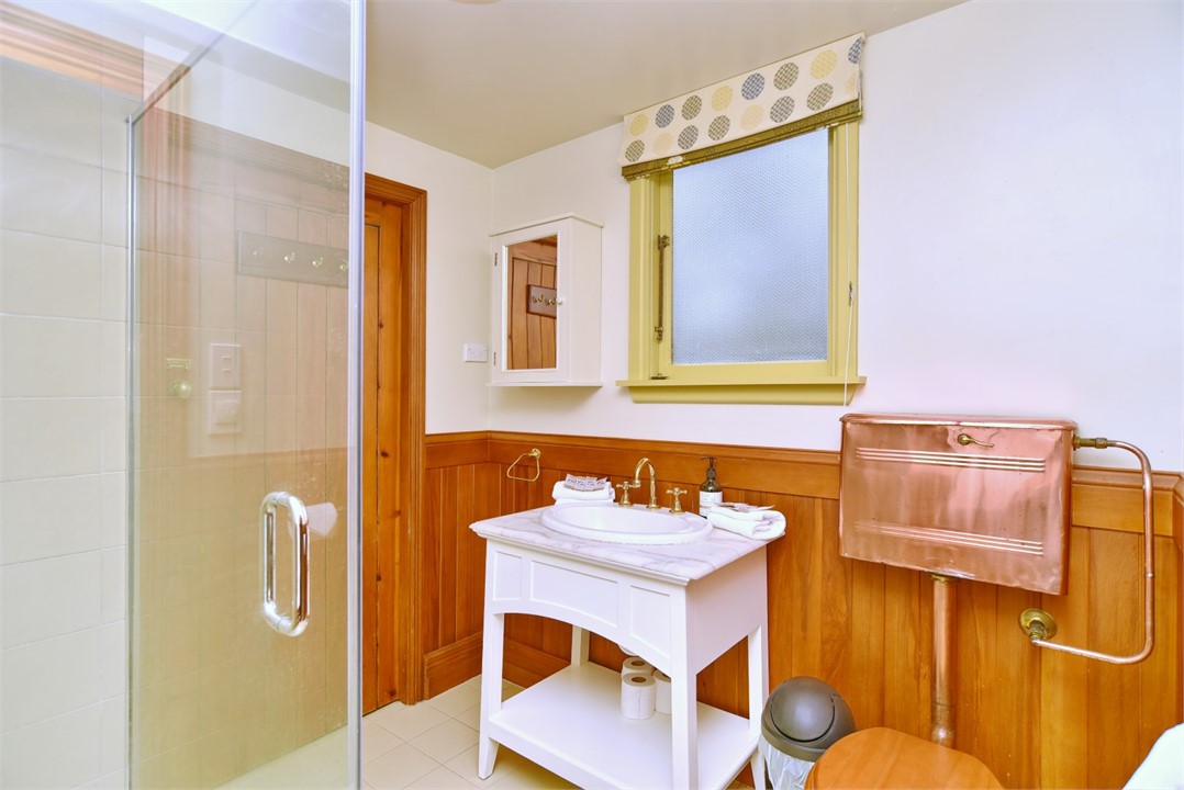 Bathroom contains a shower and a toilet