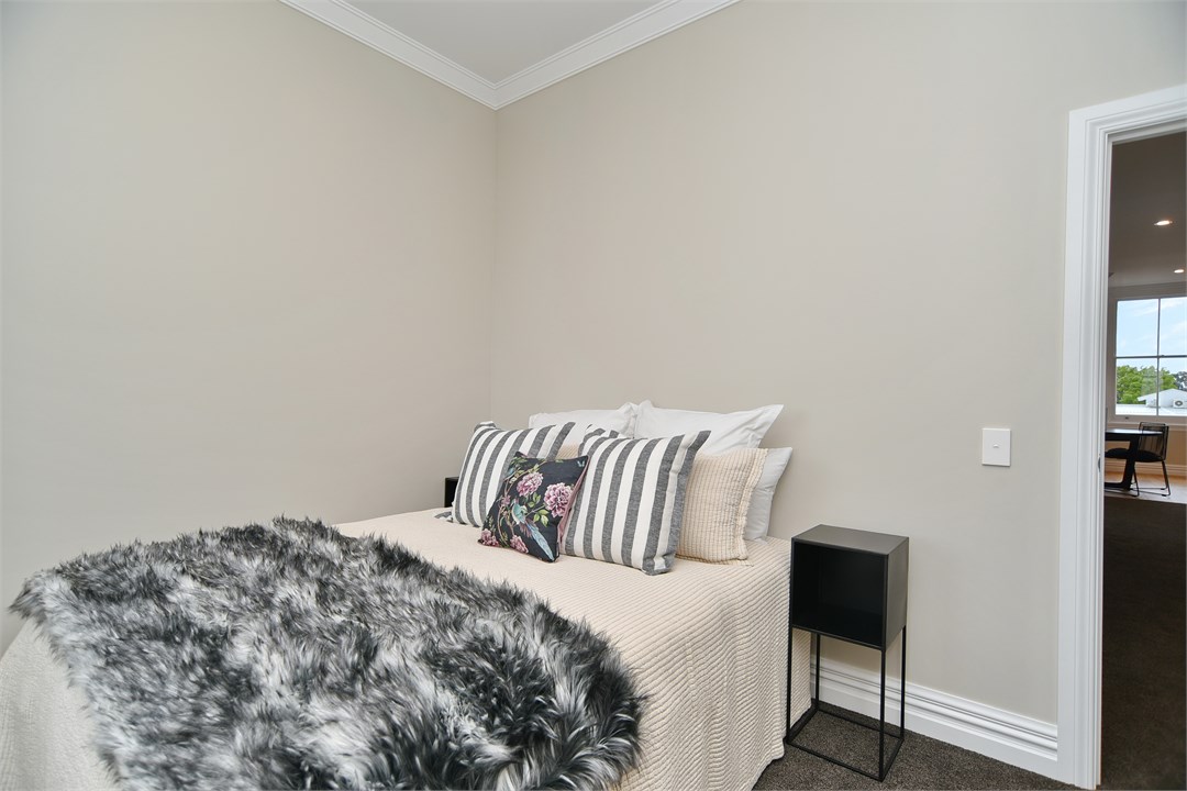 Bedroom 2 has a Queen bed