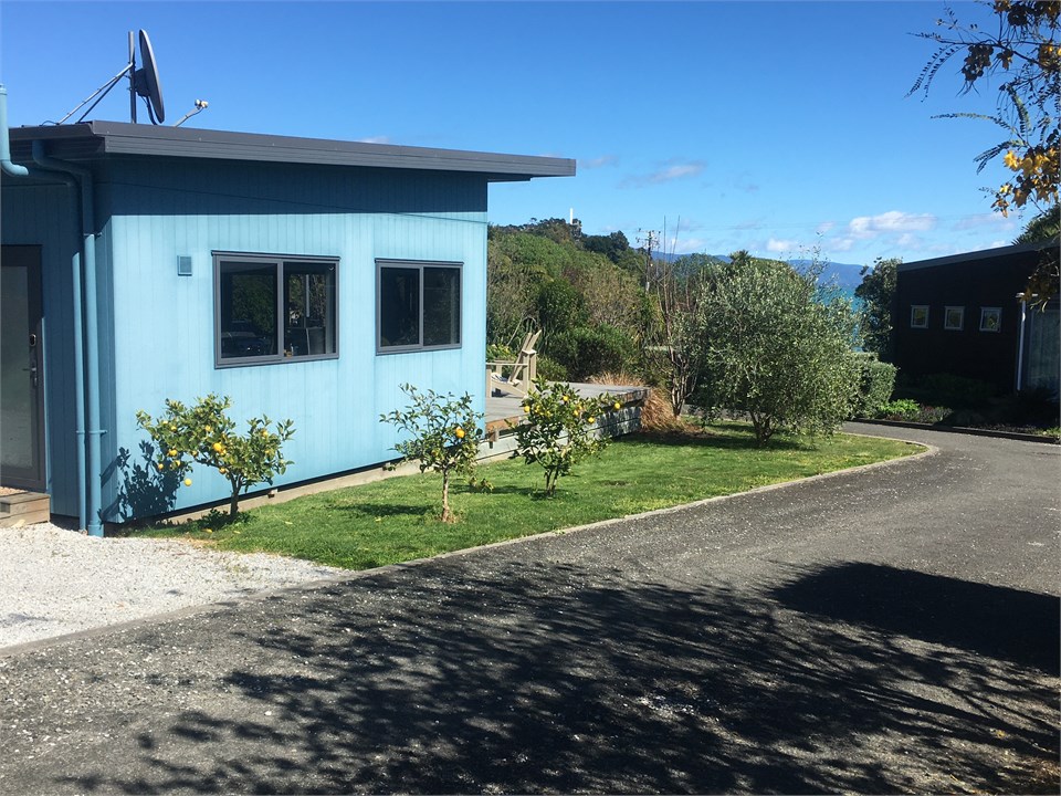 Entrance and parking at back of property