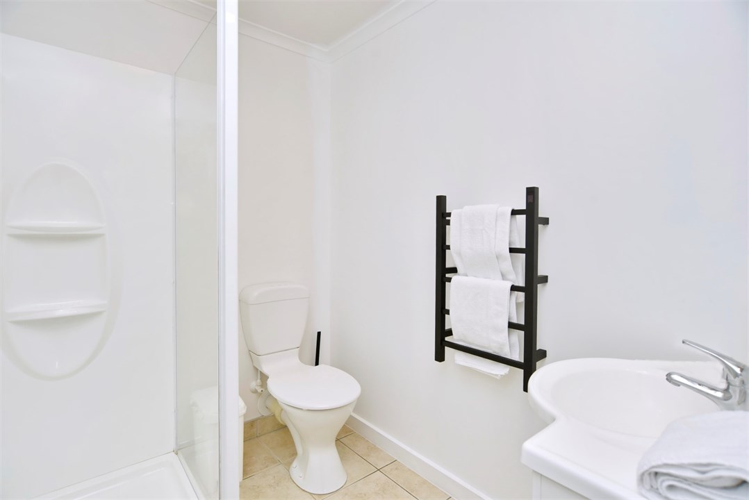 Bathroom 1 has a shower and a toilet (ensuite)