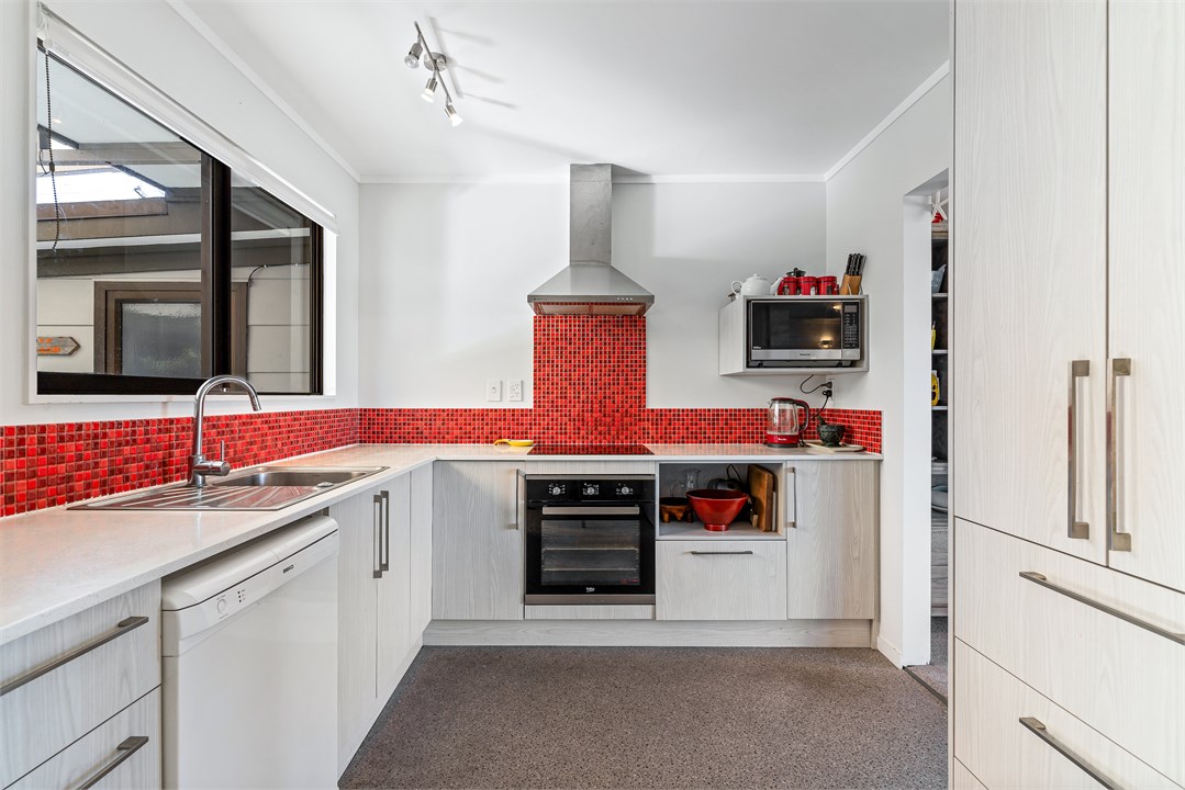 Kitchen  - Stove, microwave, dishwasher.