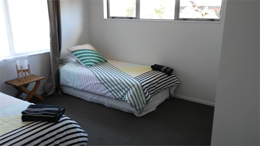 Two king single bedrooms with quality linens 