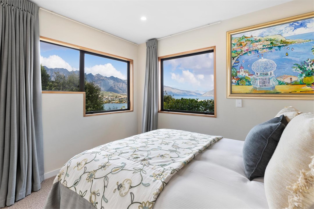 Bedroom 2 w/ queen bed + views of The Remarkables