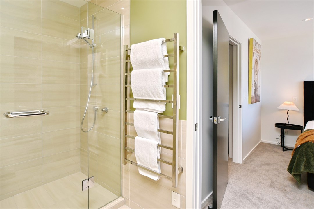 Bathroom 3 has a shower and a toilet