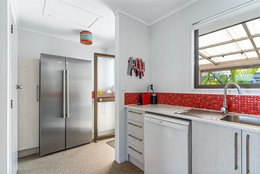 Kitchen - leads out to back porch area.