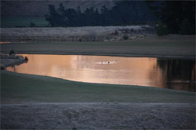 Sunrise reflected on lake