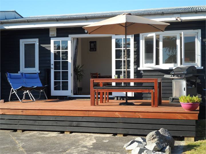 Sundrenched Deck to Large Backyard