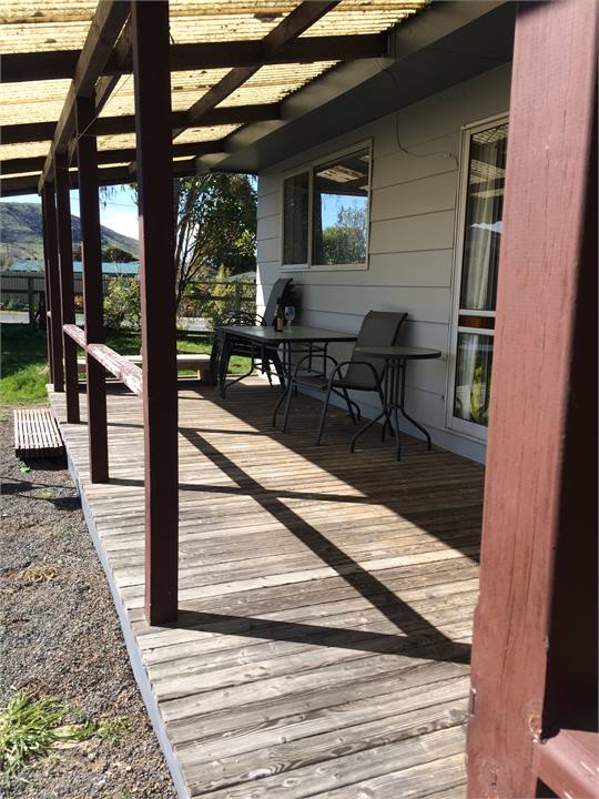 Covered outdoor deck for outdoor living in any wea