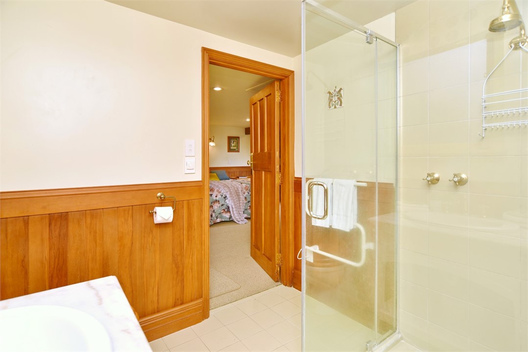 Bathroom contains a shower and a toilet
