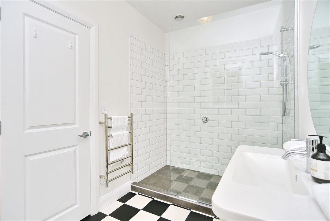 Bathroom contains a shower and a toilet