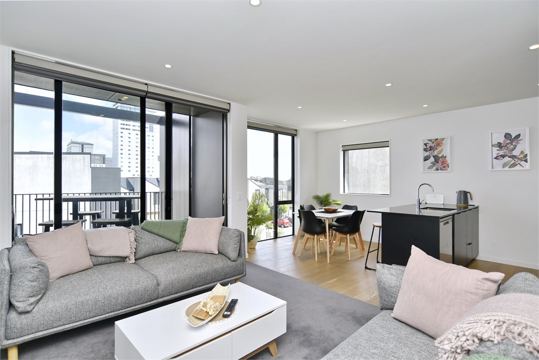 Living area has a TV and seating areas