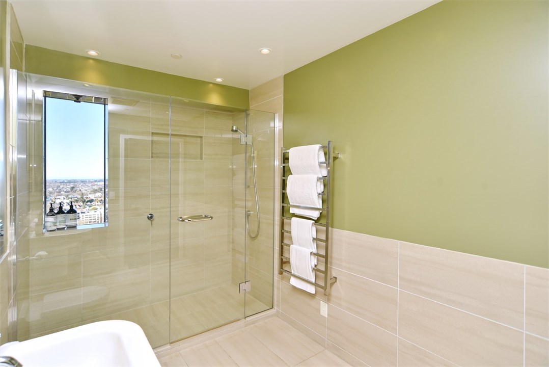 Bathroom 2 has a shower and a toilet