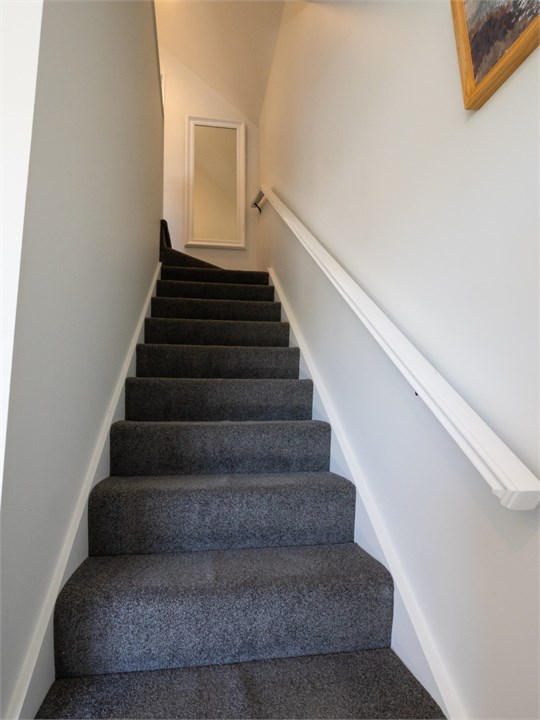 Upstairs you’ll find both bedrooms and the main ba