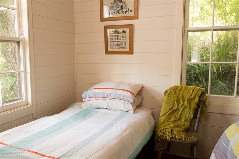 single bed and double bed in second bedroom