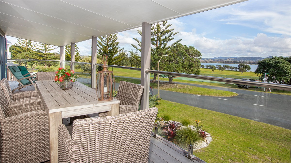 Front deck looking out over golf course to Inlet