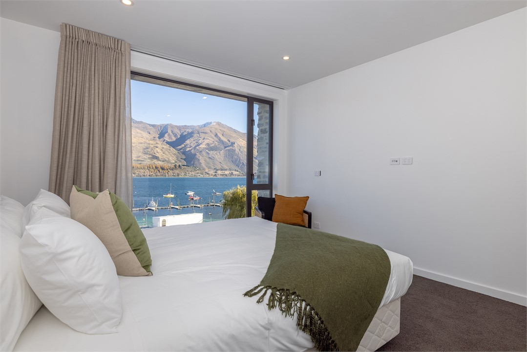 Bedroom 3 has a Queen bed and a sitting area