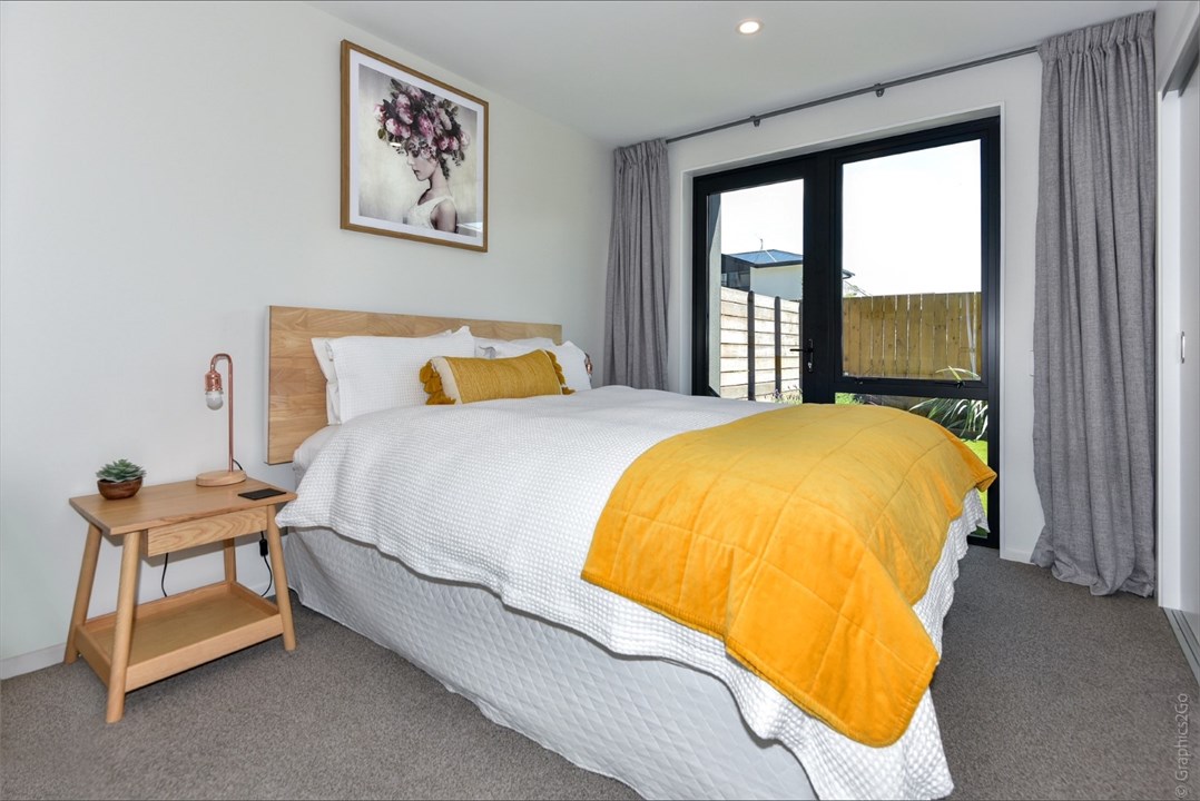 Bedroom 1 has a Queen bed