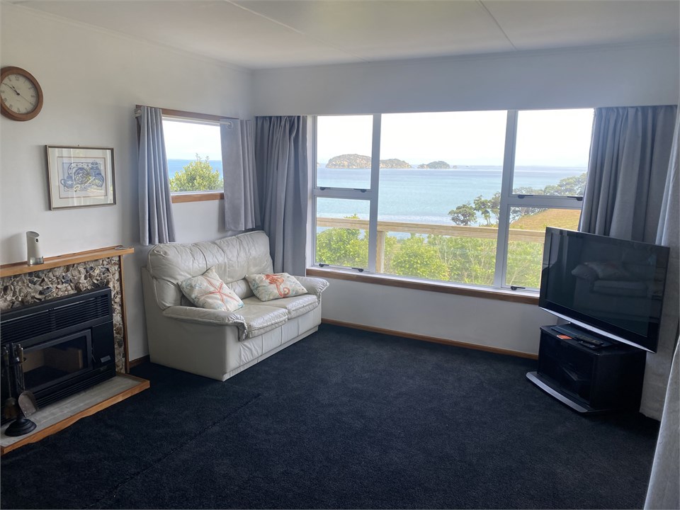 Relax in the spacious lounge with sea views