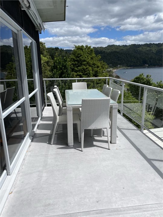 Outdoor dining with optional shade sail