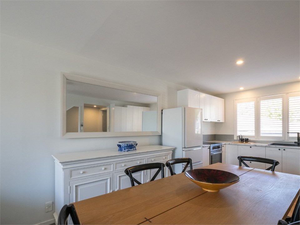 Open, inviting living area with a chic French feel