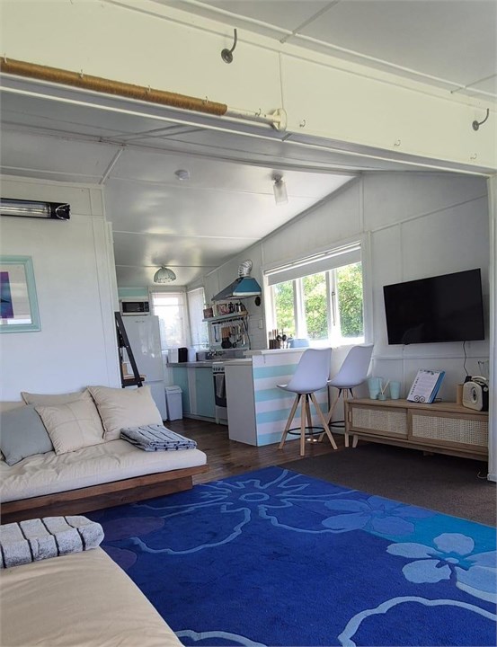 Living area- T.V- Kitchen