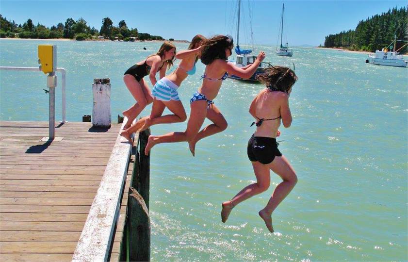 Daughter Briar and friends Mapua wharf jumping