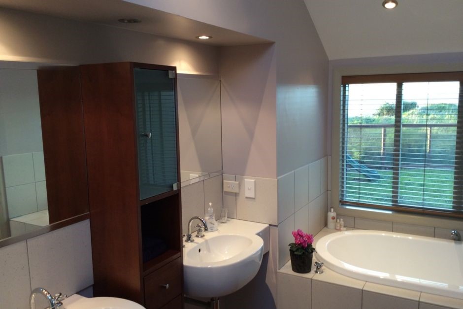 Master ensuite bathroom with bath, double shower