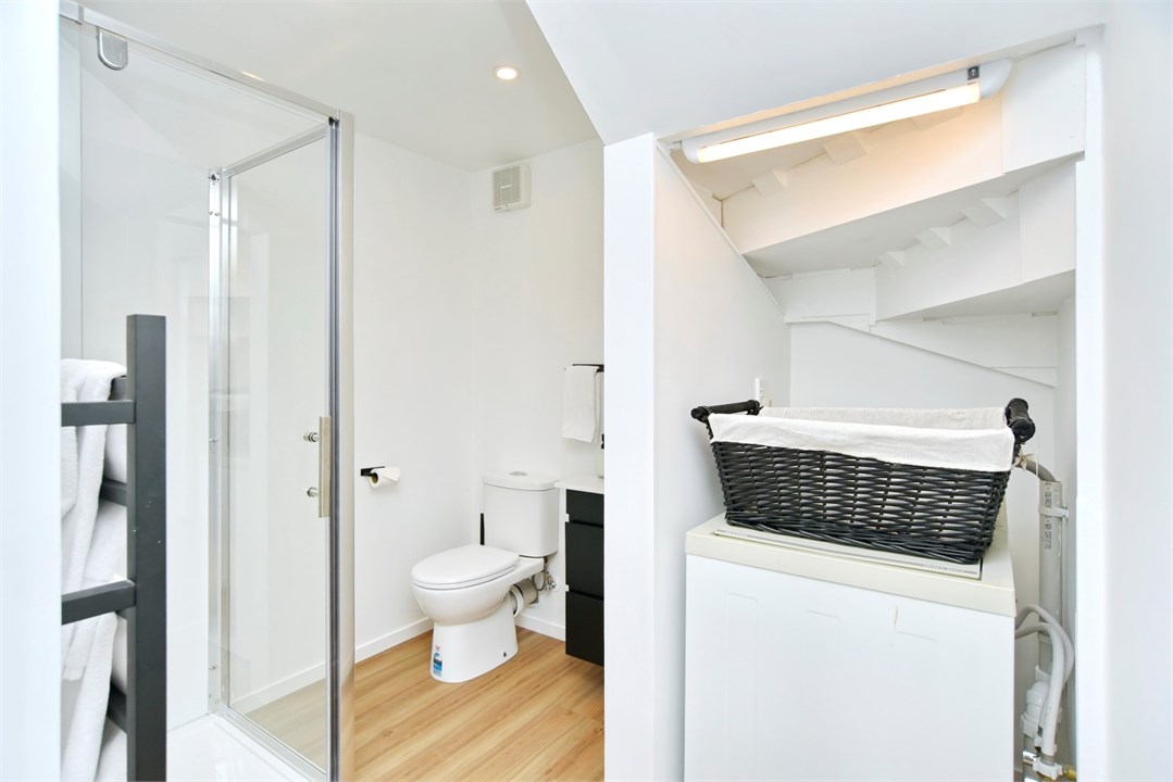 Bathroom 2 has a shower and a toilet