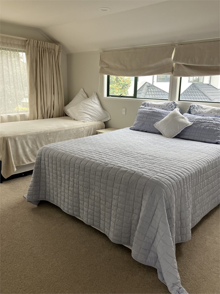 Master bedroom with King bed and King Single (roll