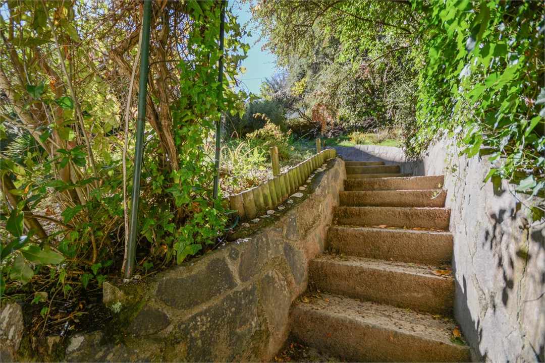 View of the stairs leading up to the property